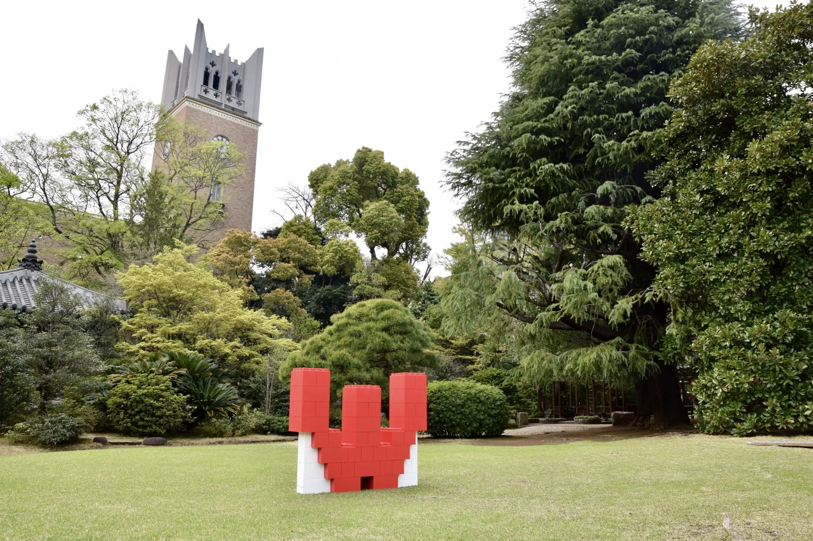 Campus garden and historic clock tower in the Waseda area